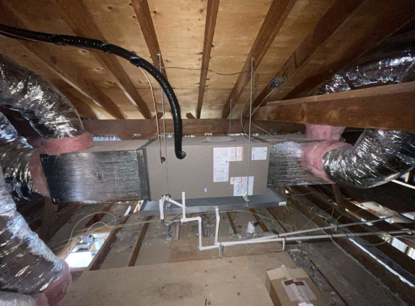 Completed attic duct and HVAC installation